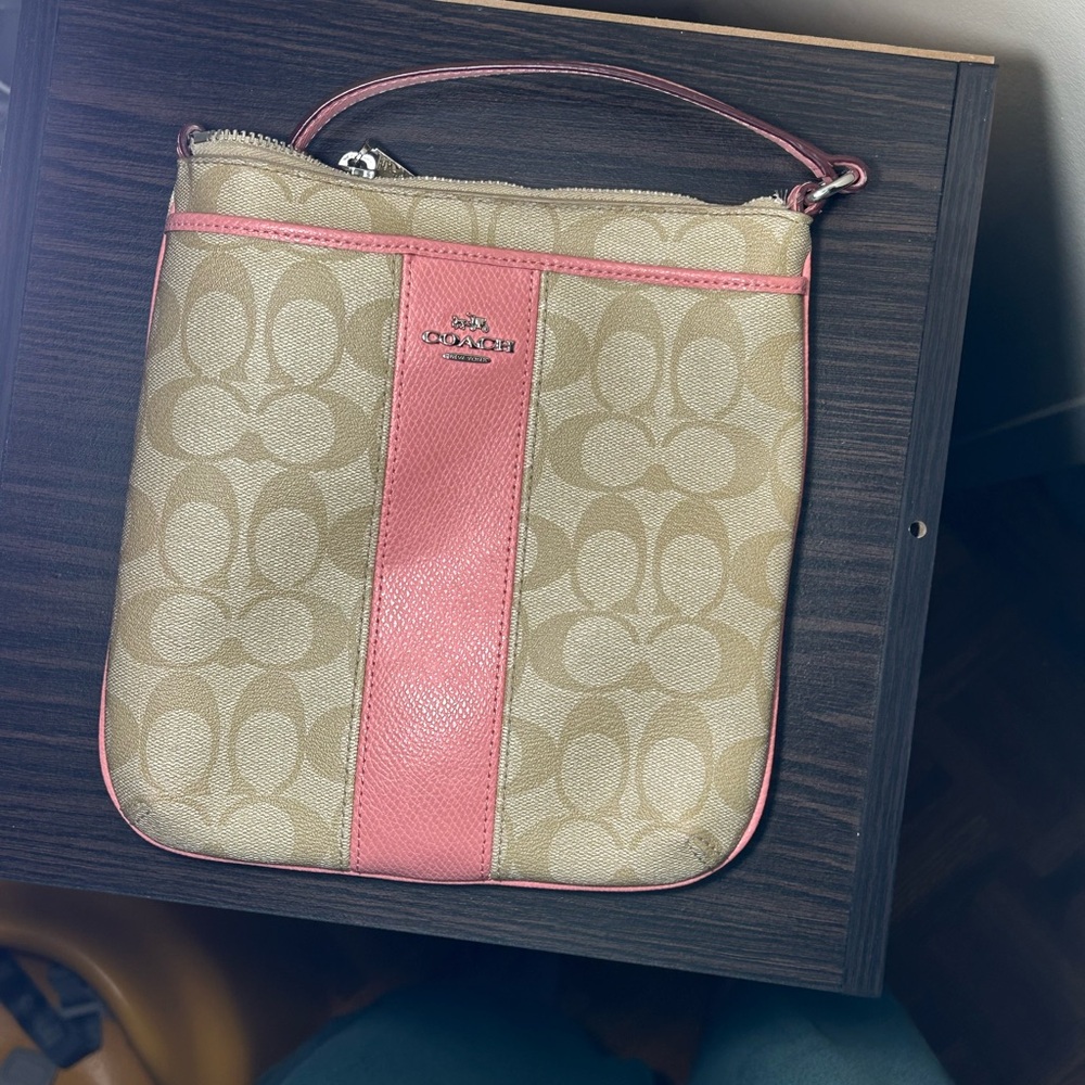 Coach crossbody with easy access frond pocket